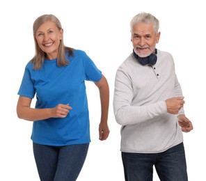 Photo of Senior couple dancing together on white background