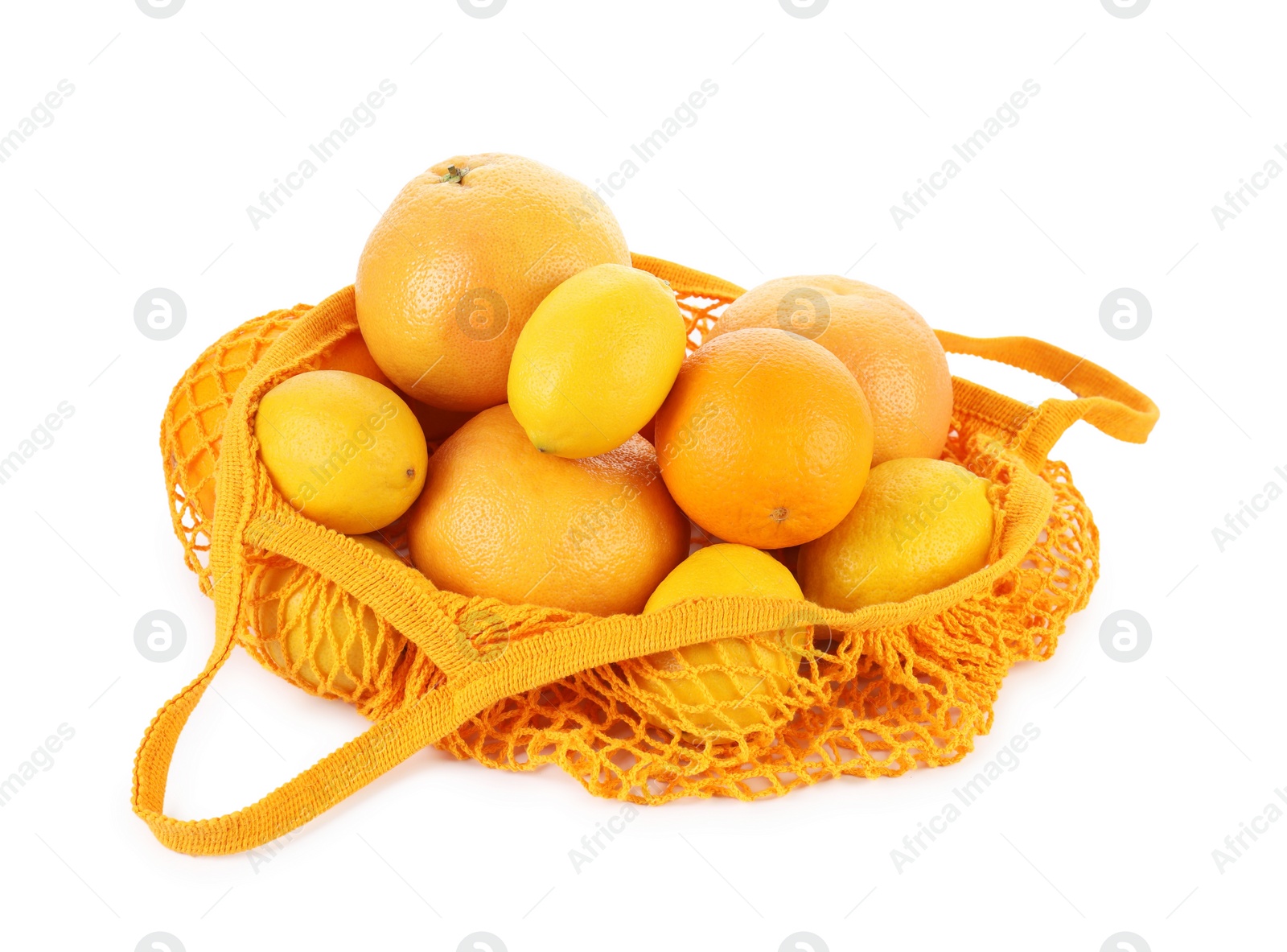 Photo of String bag with oranges and lemons isolated on white