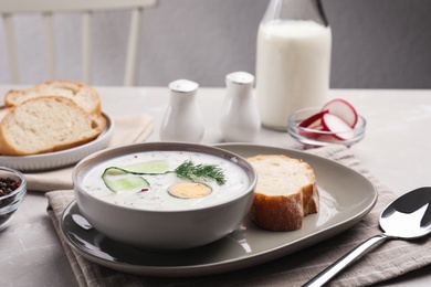 Photo of Delicious cold summer soup on light table