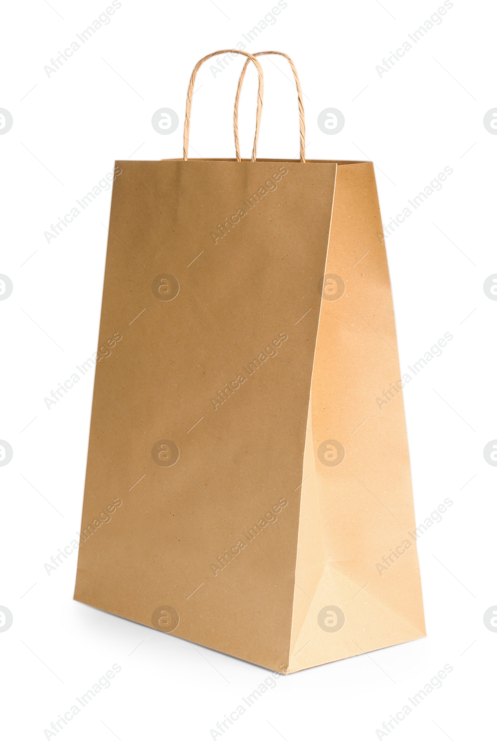 Photo of One kraft paper bag isolated on white. Mockup for design