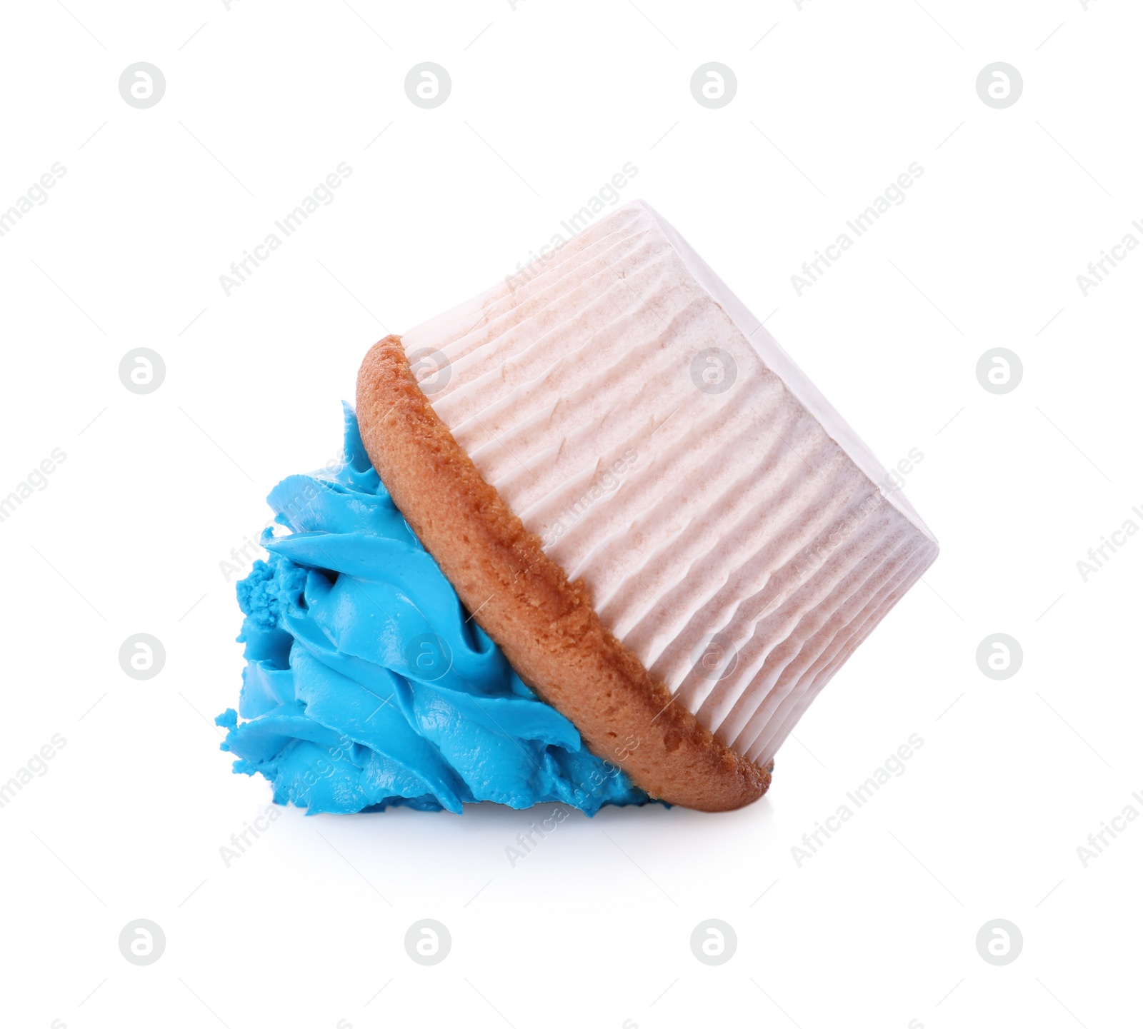 Photo of Dropped cupcake with cream on white background. Troubles happen