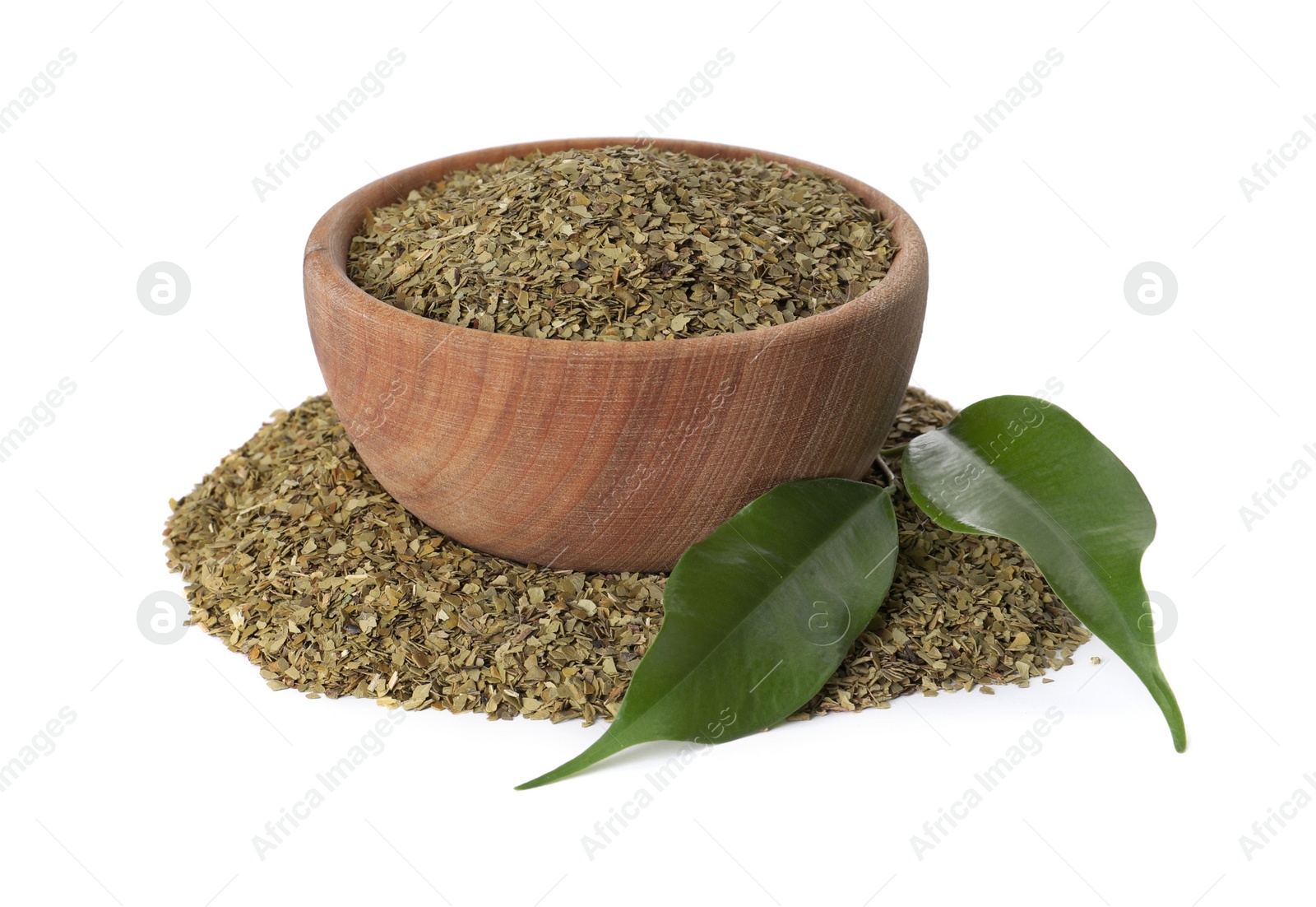 Photo of Wooden bowl with aromatic mate tea on white background