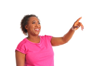 Portrait of happy African-American woman on white background