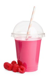Photo of Plastic cup of tasty raspberry smoothie and fresh fruits on white background