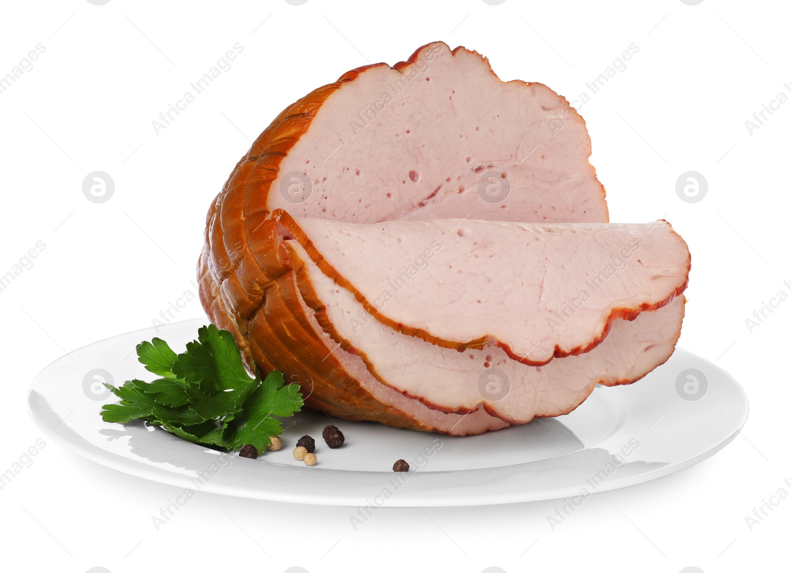 Photo of Delicious sliced ham with parsley and peppercorns isolated on white