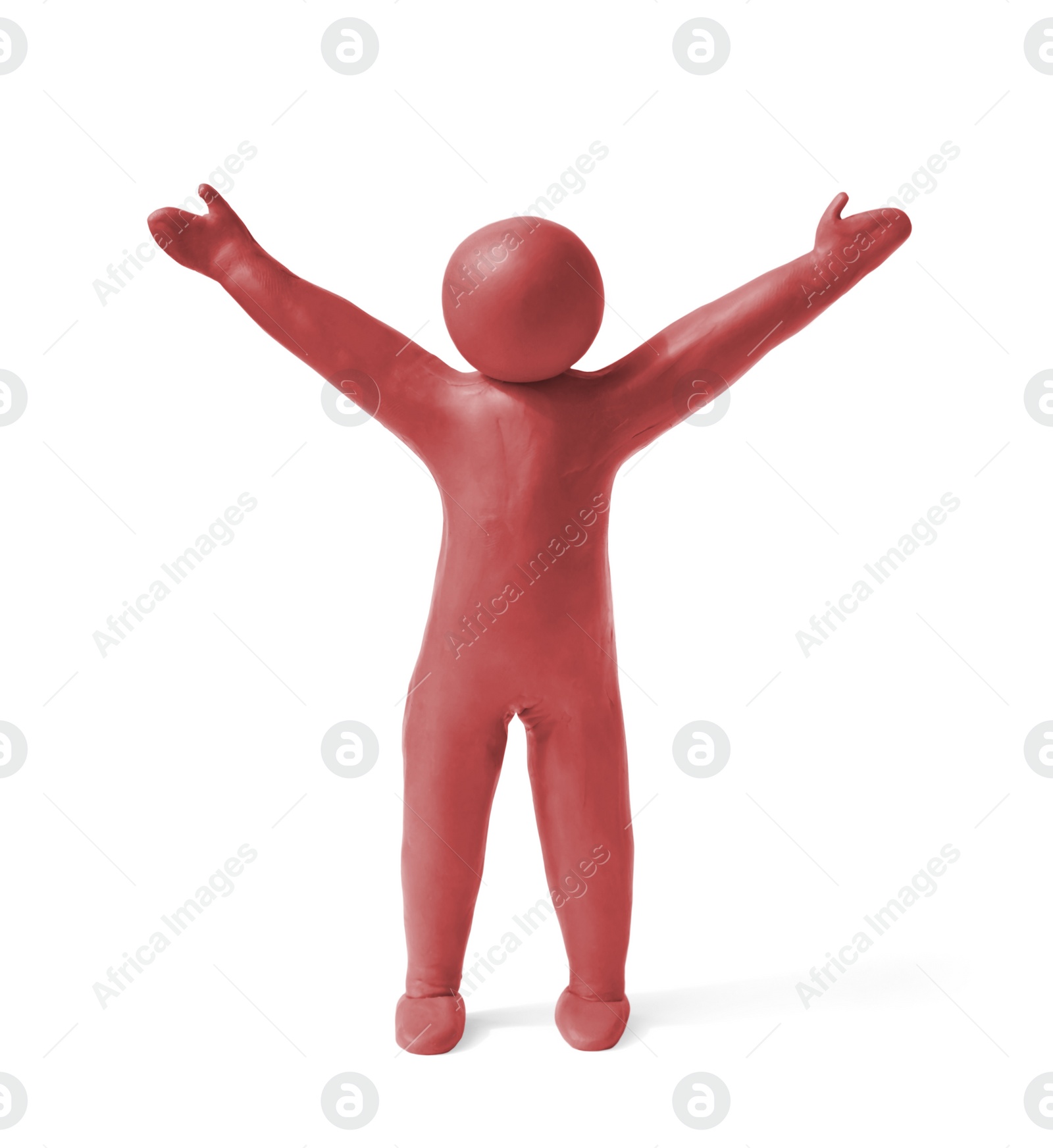 Photo of Human figure with arms wide open made of red plasticine isolated on white