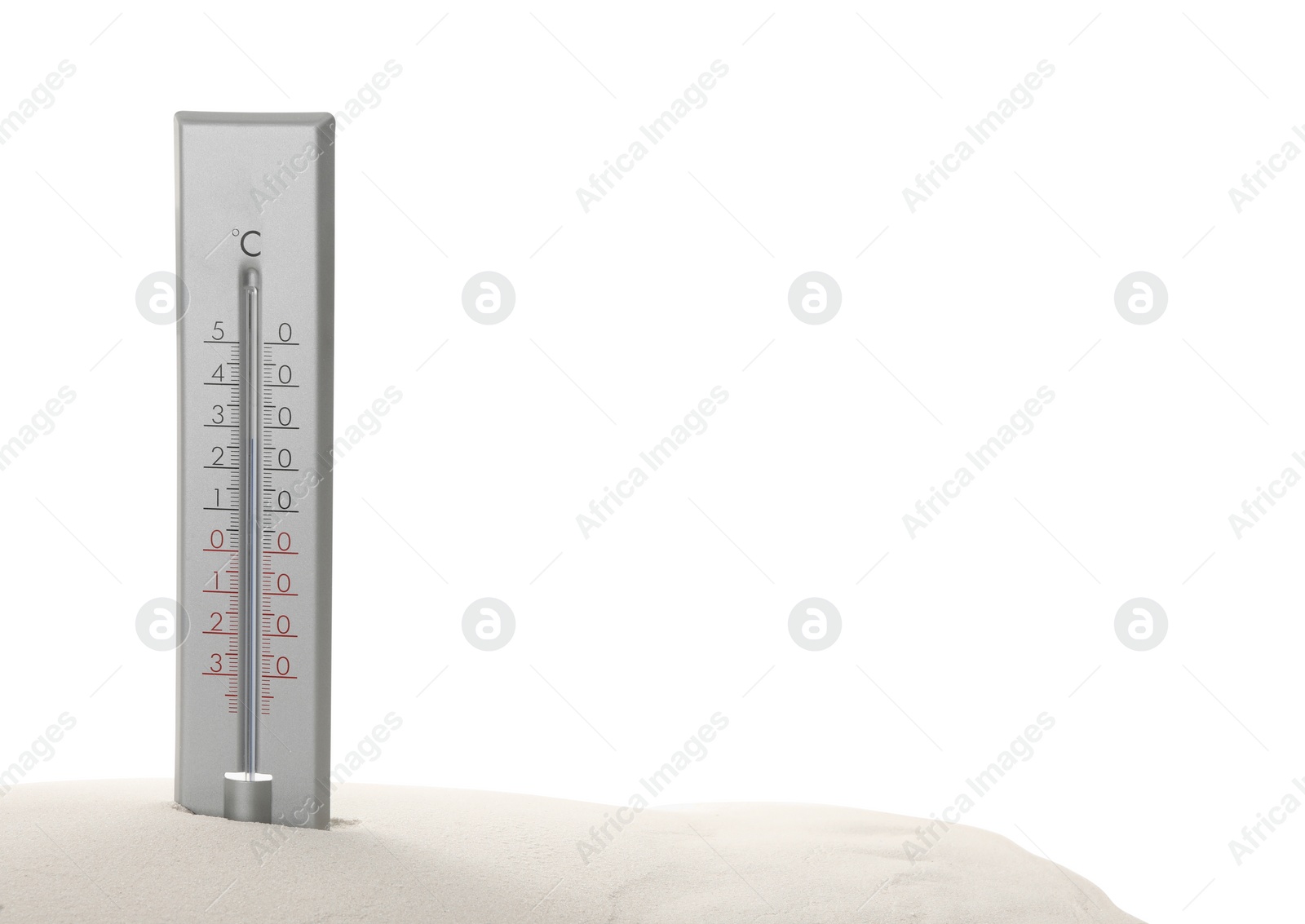 Photo of Weather thermometer in sand against white background