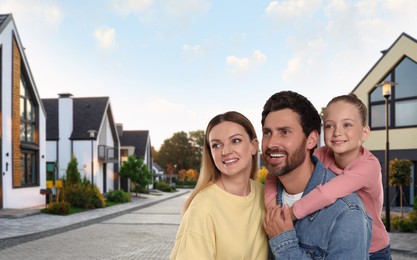 Image of Portrait of happy family with child on street