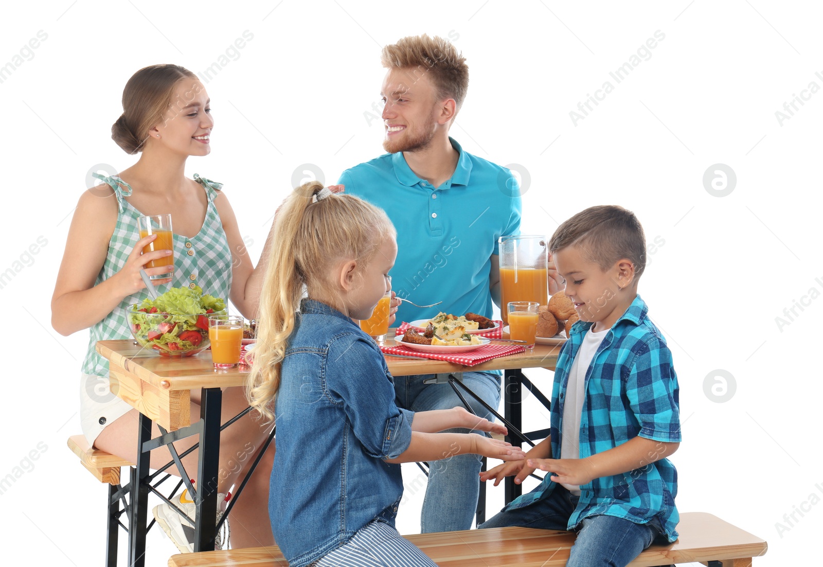 Photo of Happy family having picnic at table on white background