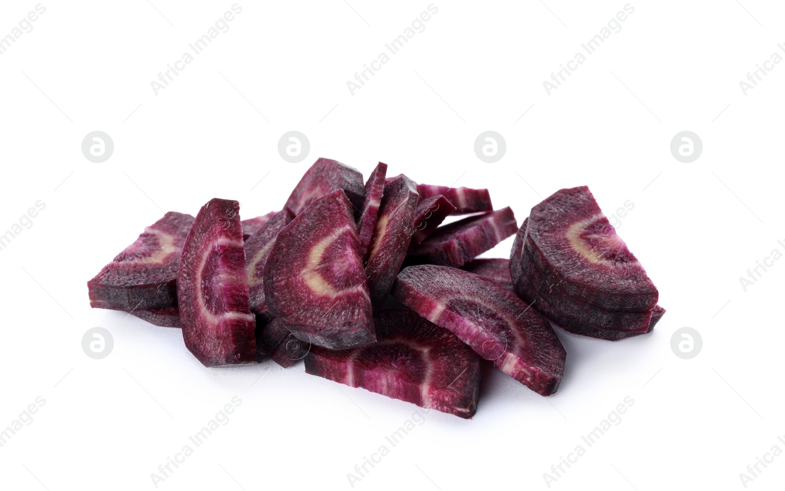 Photo of Slices of raw purple carrot isolated on white