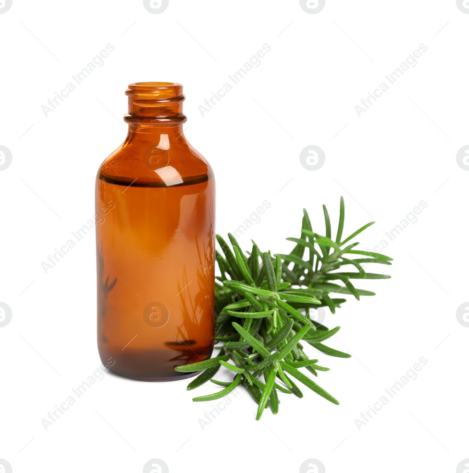 Photo of Sprig of fresh rosemary and essential oil on white background