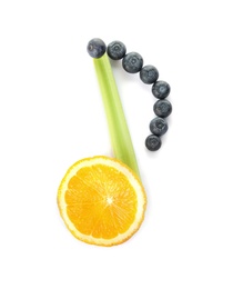 Photo of Musical note made of lemon, celery and berries on white background, top view