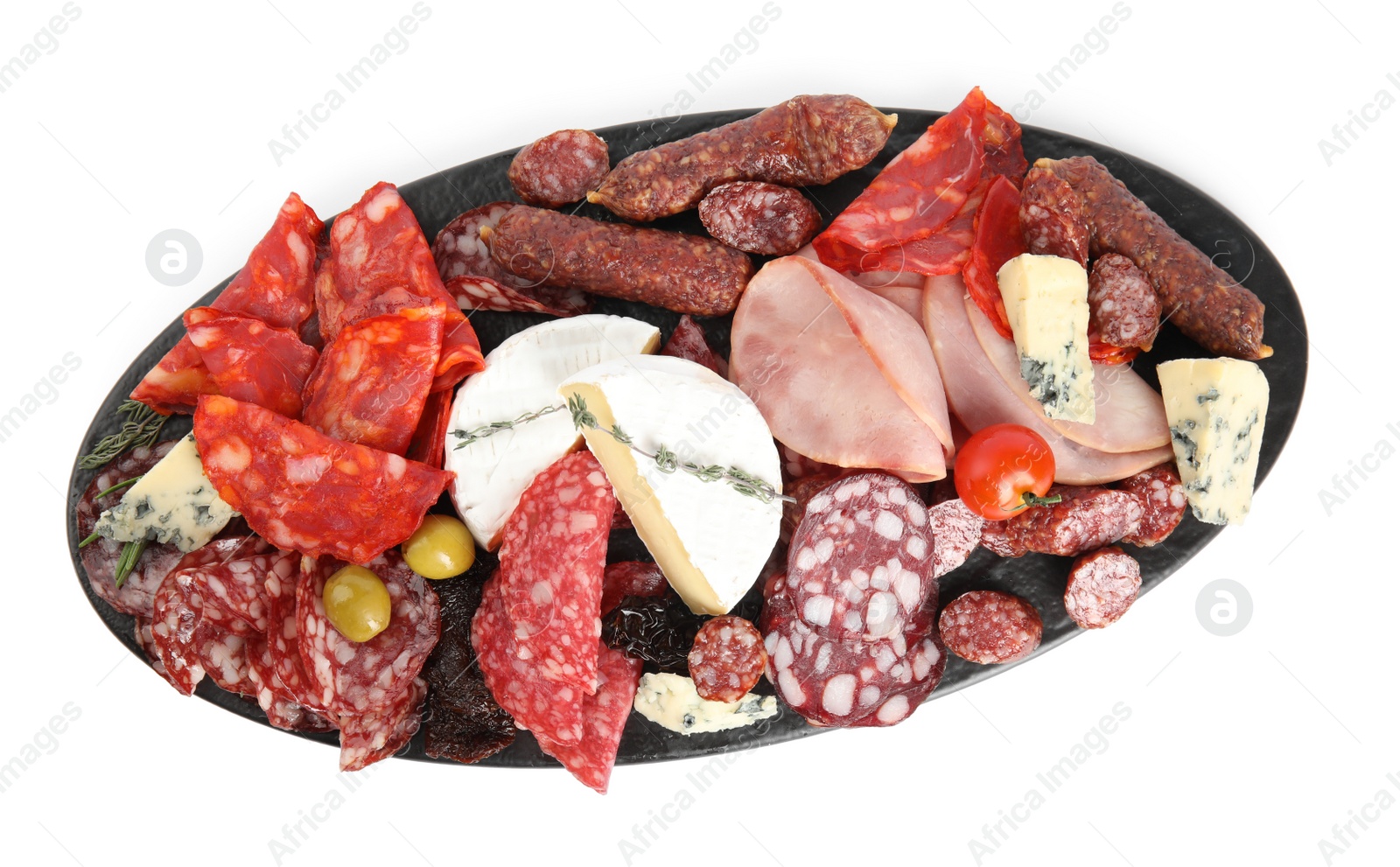 Photo of Slate plate with tasty ham and other delicacies isolated on white, top view