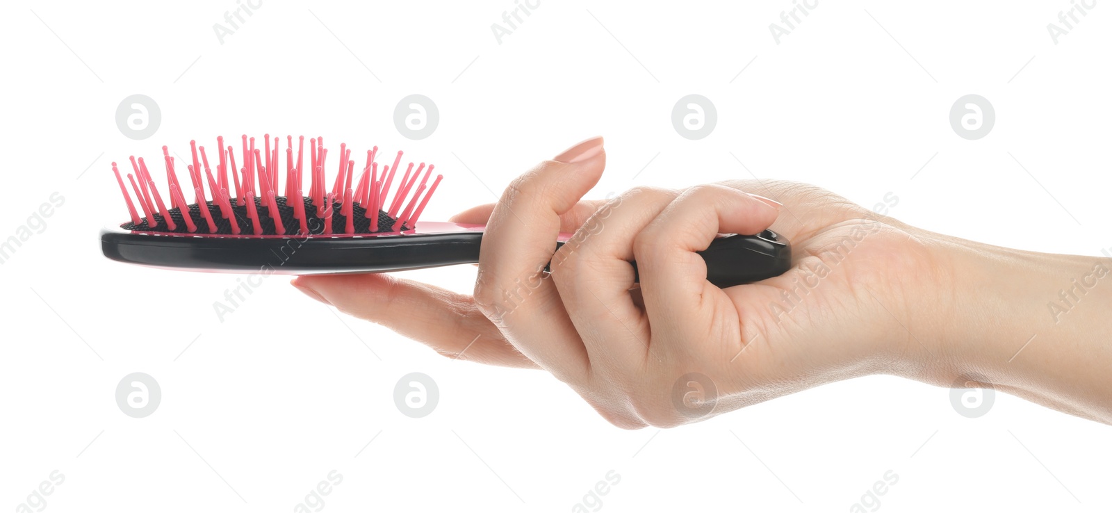 Photo of Woman holding modern hair brush on white background, closeup