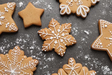 Tasty Christmas cookies on grey table, flat lay