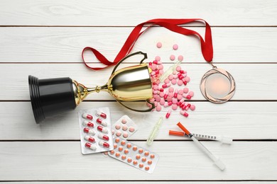 Flat lay composition with drugs on white wooden table. Doping control