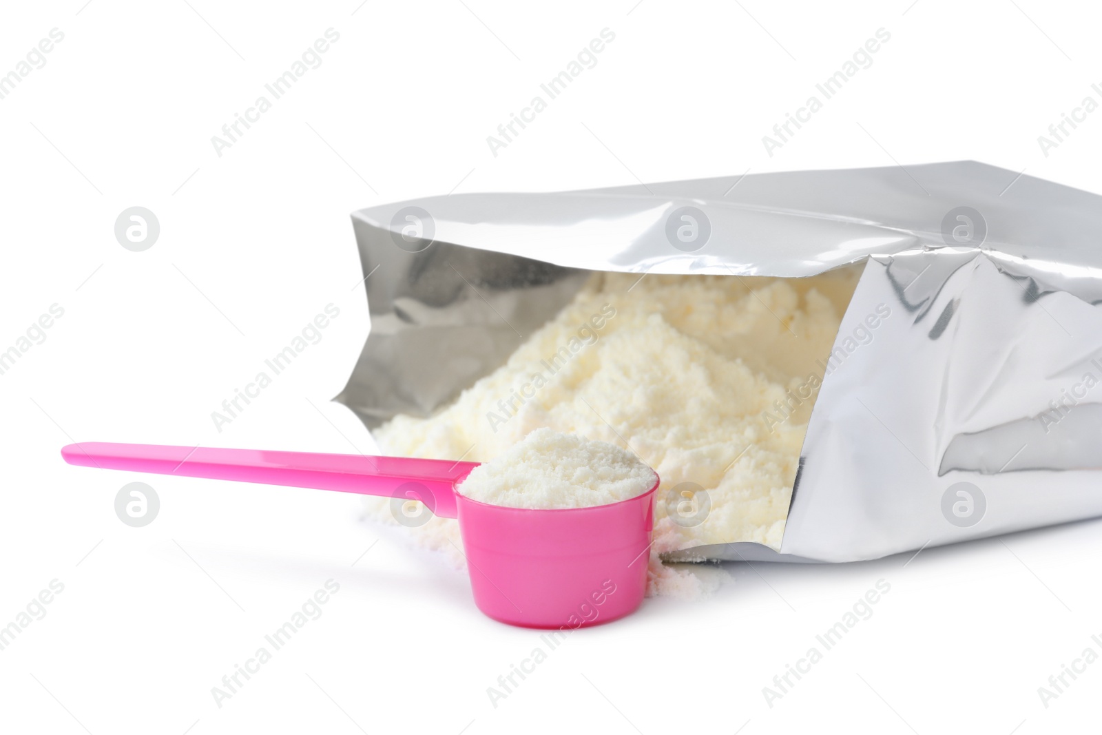 Photo of Bag of powdered infant formula and scoop on white background. Baby milk