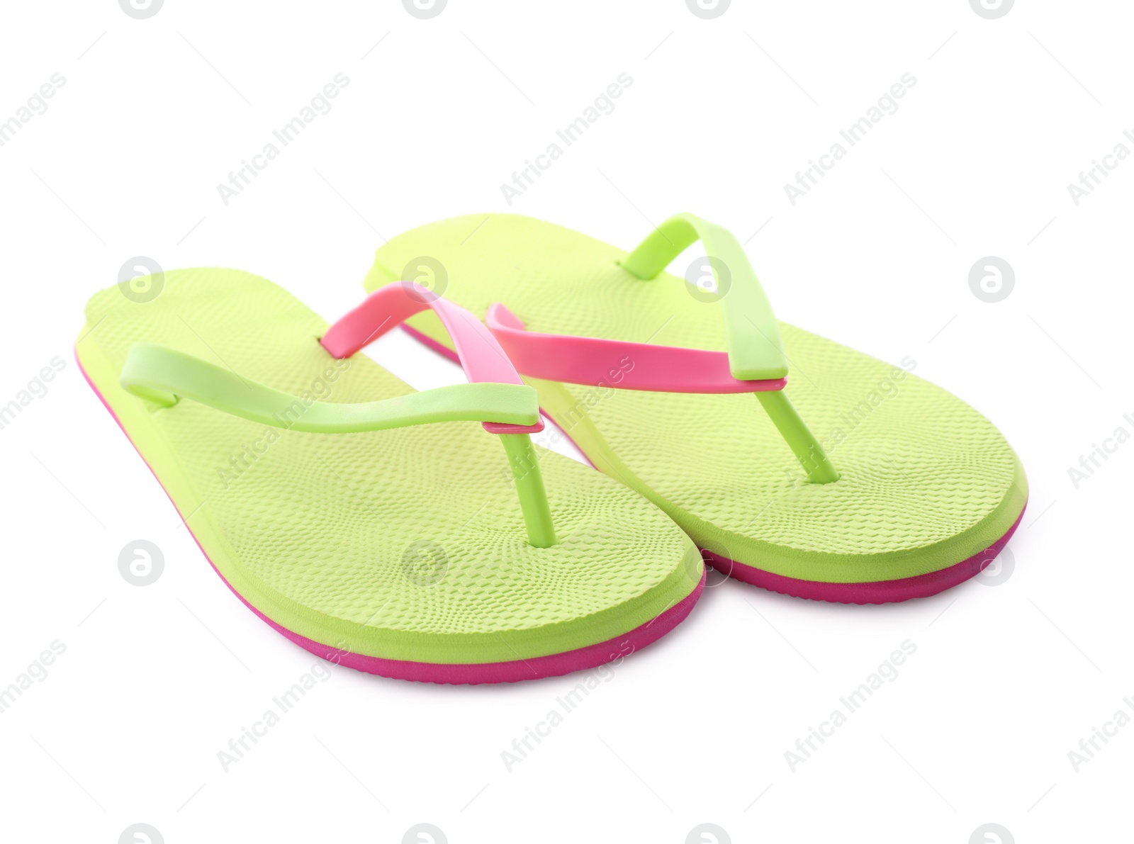 Photo of Pair of stylish green flip flops isolated on white. Beach object