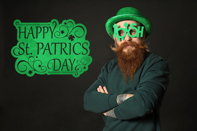 Man in green leprechaun hat with party glasses on black background St. Patrick's Day celebration