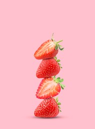 Image of Stack of fresh strawberries on pink background