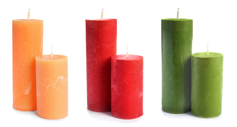 Set of color wax candles on white background. Banner design