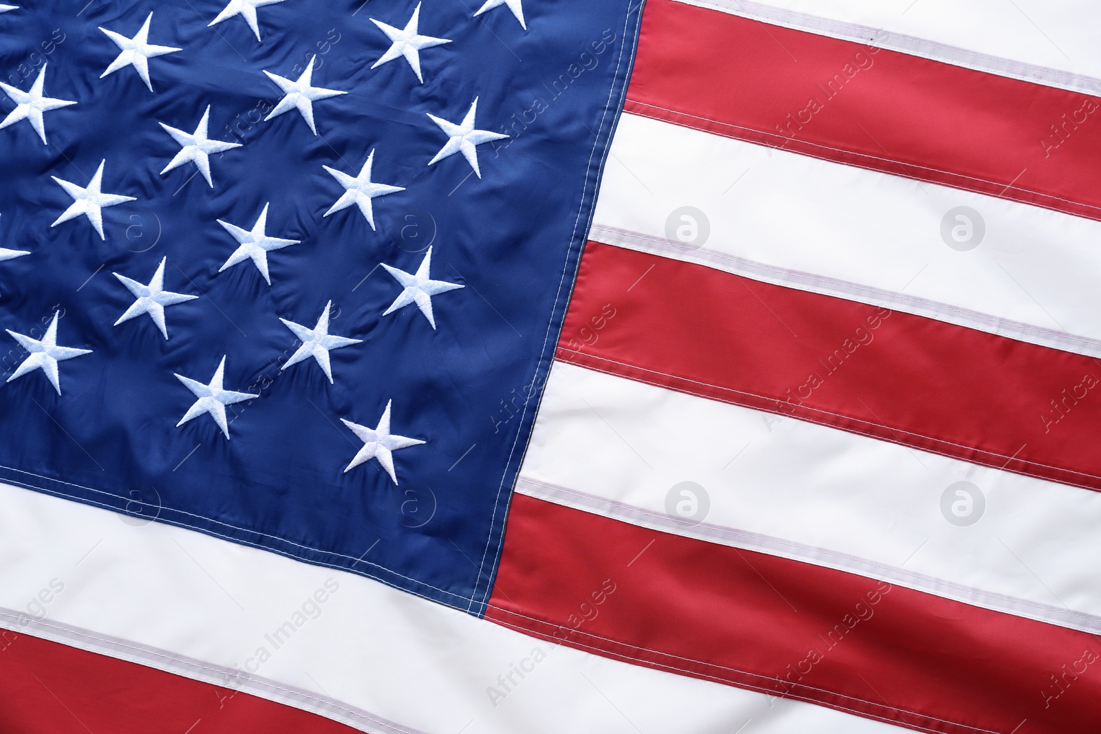 Photo of American flag as background, top view. National symbol