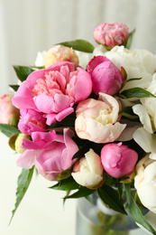 Photo of Bouquet of beautiful fresh peonies indoors, closeup