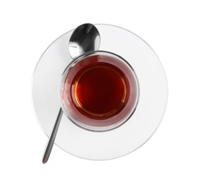Photo of Glass of traditional Turkish tea with spoon isolated on white, top view