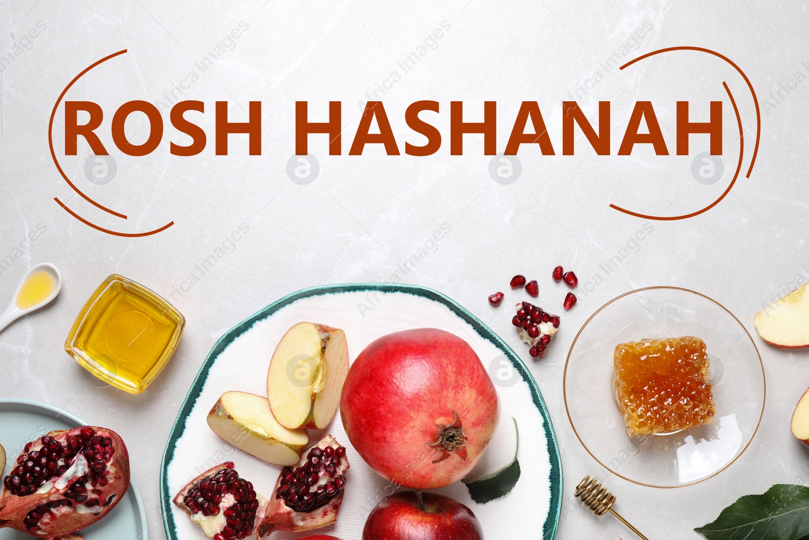Image of Honey, apples and pomegranates on white table, flat lay. Rosh Hashanah holiday