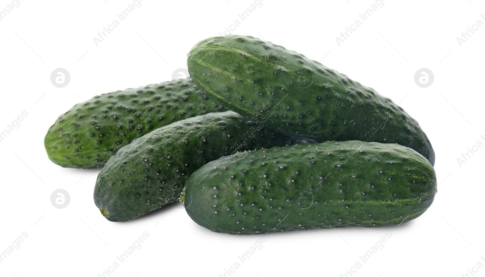 Photo of Whole fresh green cucumbers on white background