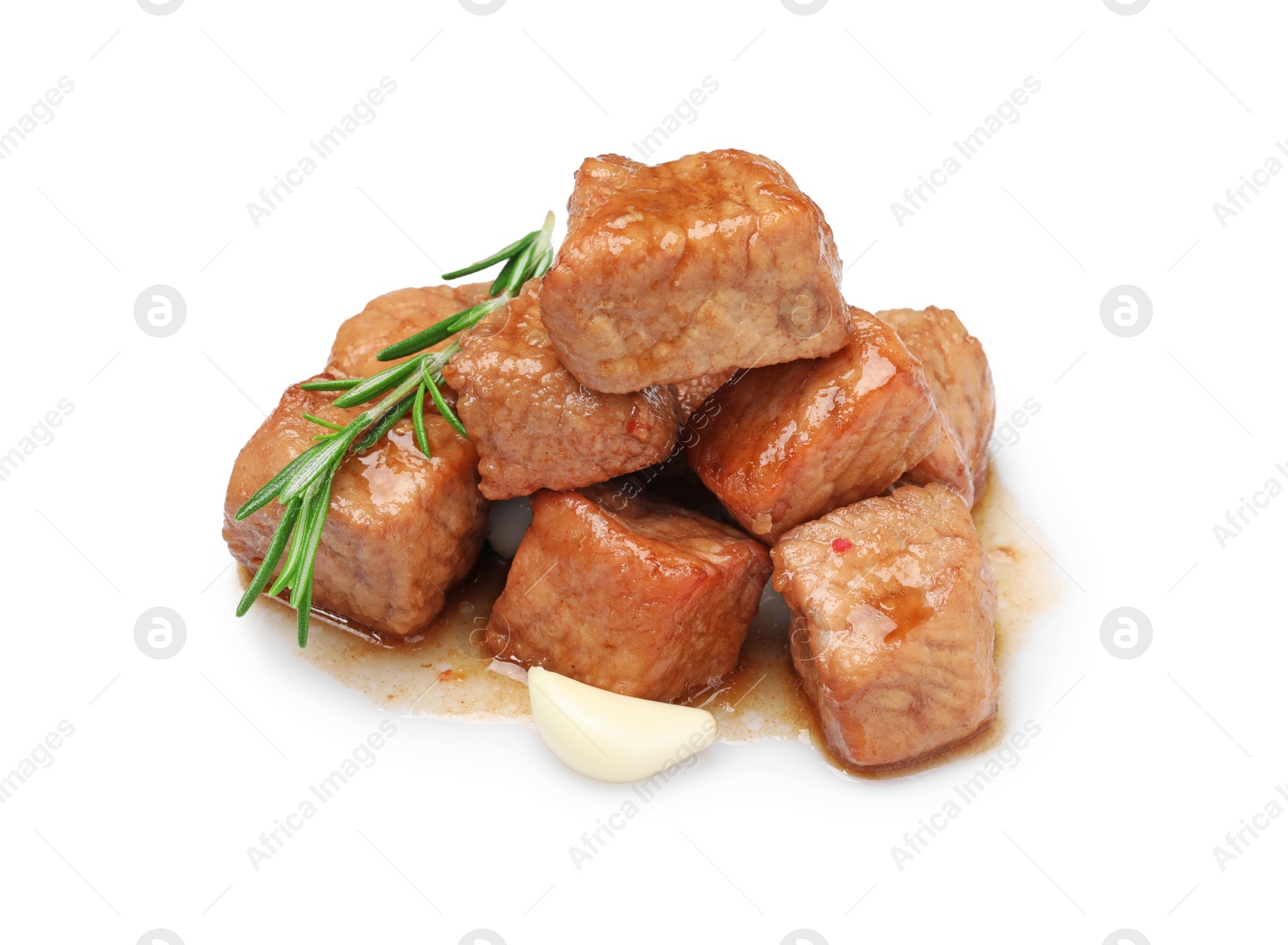 Photo of Pieces of delicious cooked beef, garlic and rosemary isolated on white. Tasty goulash