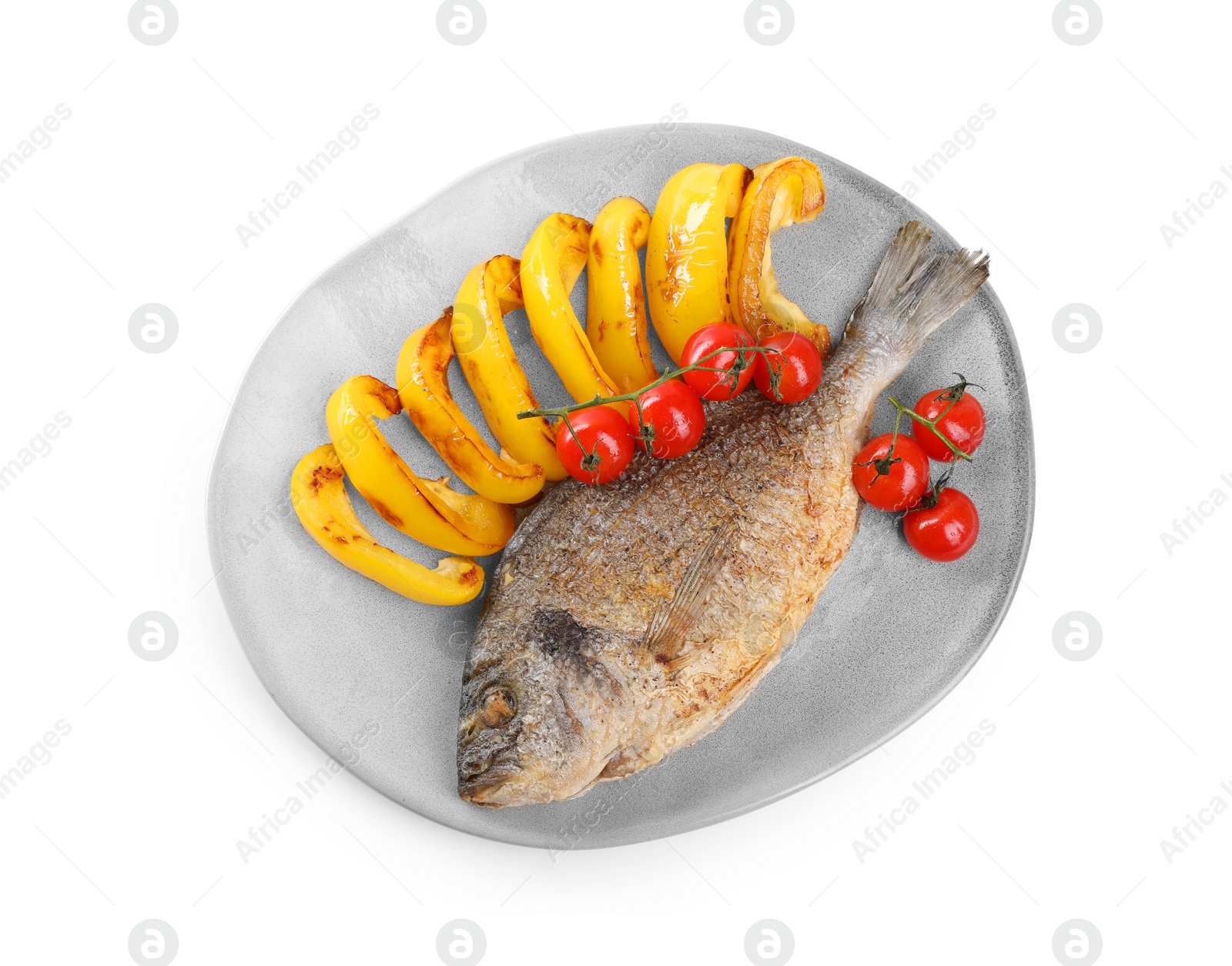 Photo of Delicious roasted dorado fish, bell pepper and tomatoes isolated on white, top view