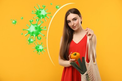 Image of Happy woman with food products on golden background. Healthy diet - strong immunity