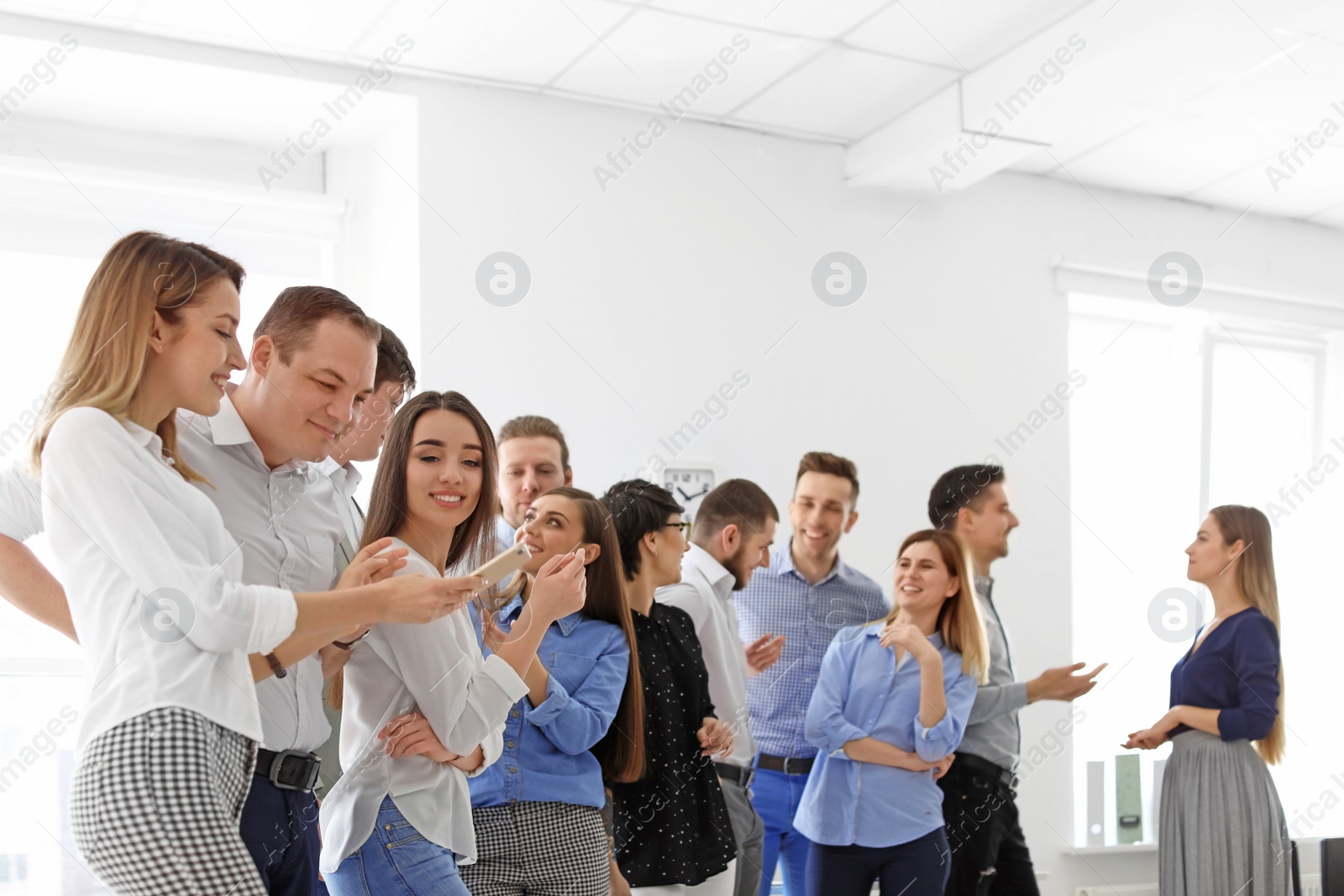 Photo of Young people having business training in office