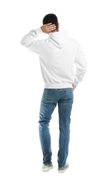 Photo of Young man in sweater isolated on white. Mock up for design