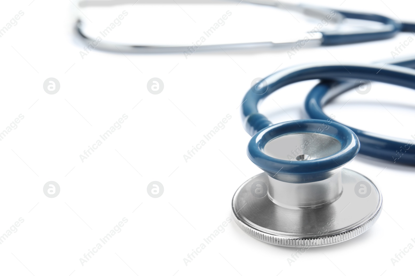 Photo of Stethoscope isolated on white, closeup. Medical tool