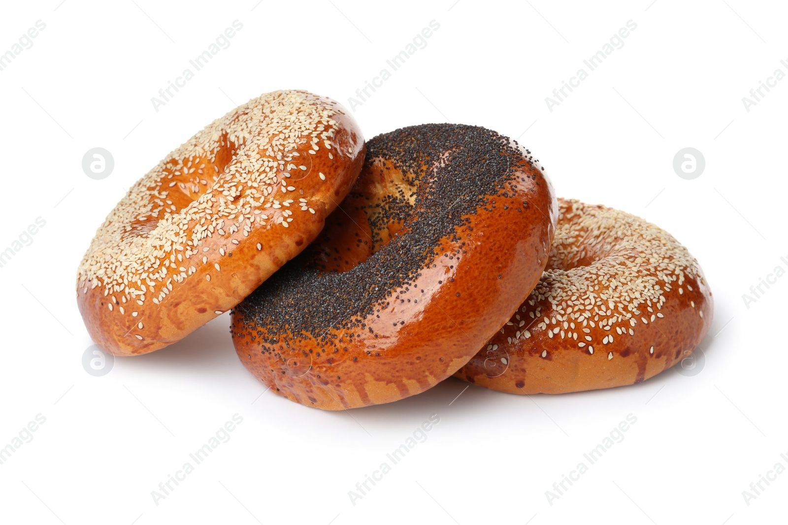 Photo of Three delicious fresh bagels on white background