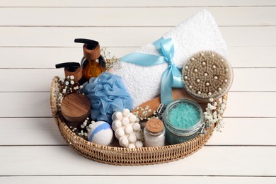 Photo of Spa gift set with different personal care products on white wooden table