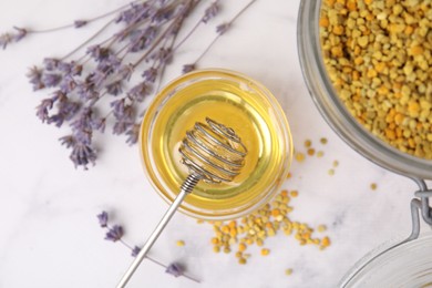Photo of Fresh honey in bowl, dipper, bee pollen granules and lavender on light table, flat lay