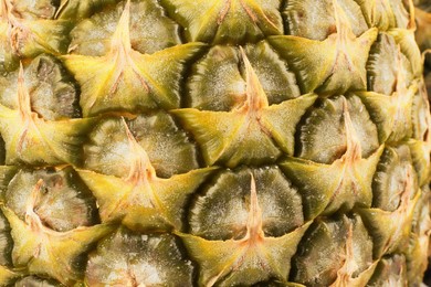 Photo of Delicious ripe pineapple as background, closeup view