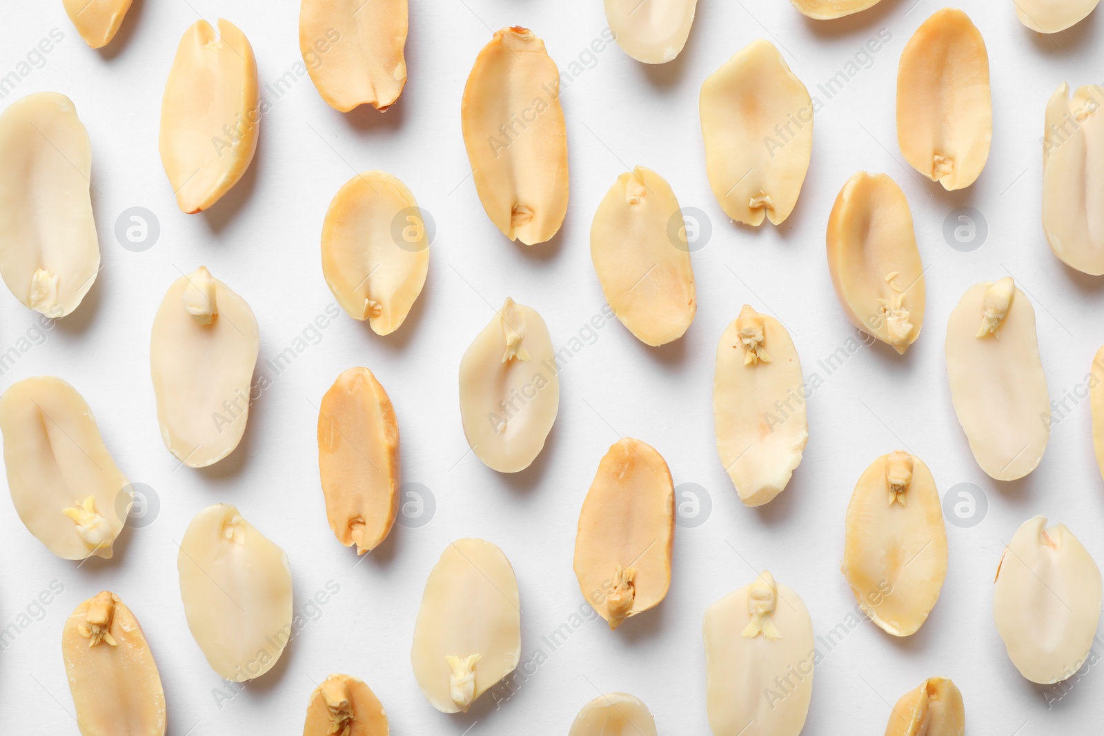 Photo of Fresh peanuts on white background, flat lay