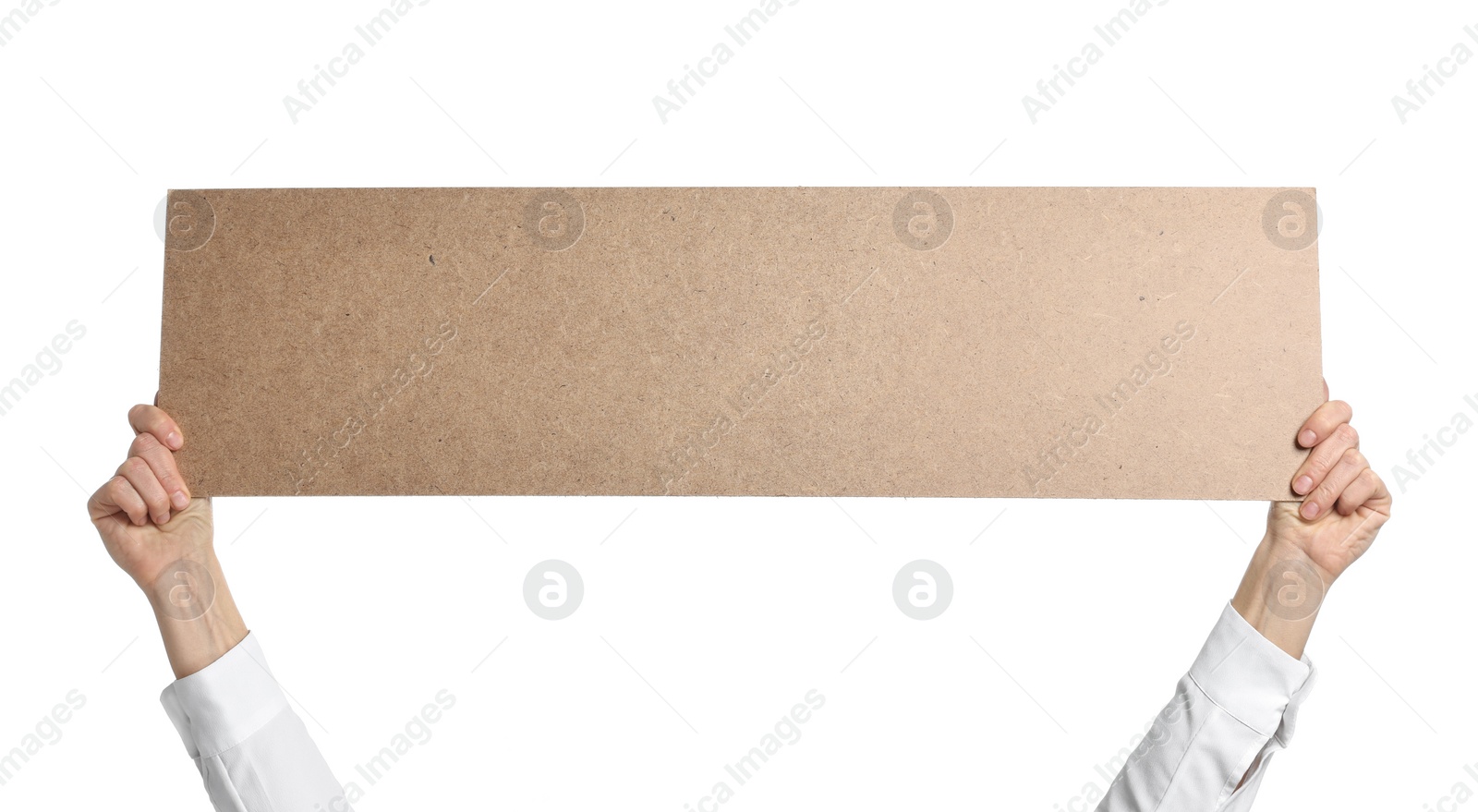 Photo of Woman holding blank cardboard banner on white background, closeup. Space for text