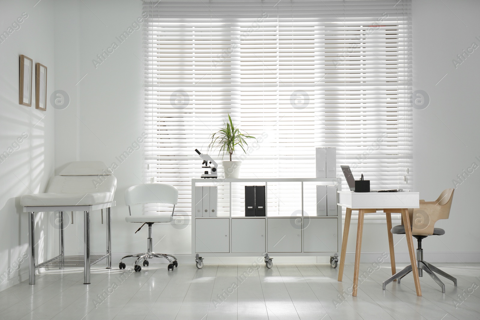 Photo of Doctor's office interior with modern workplace in clinic