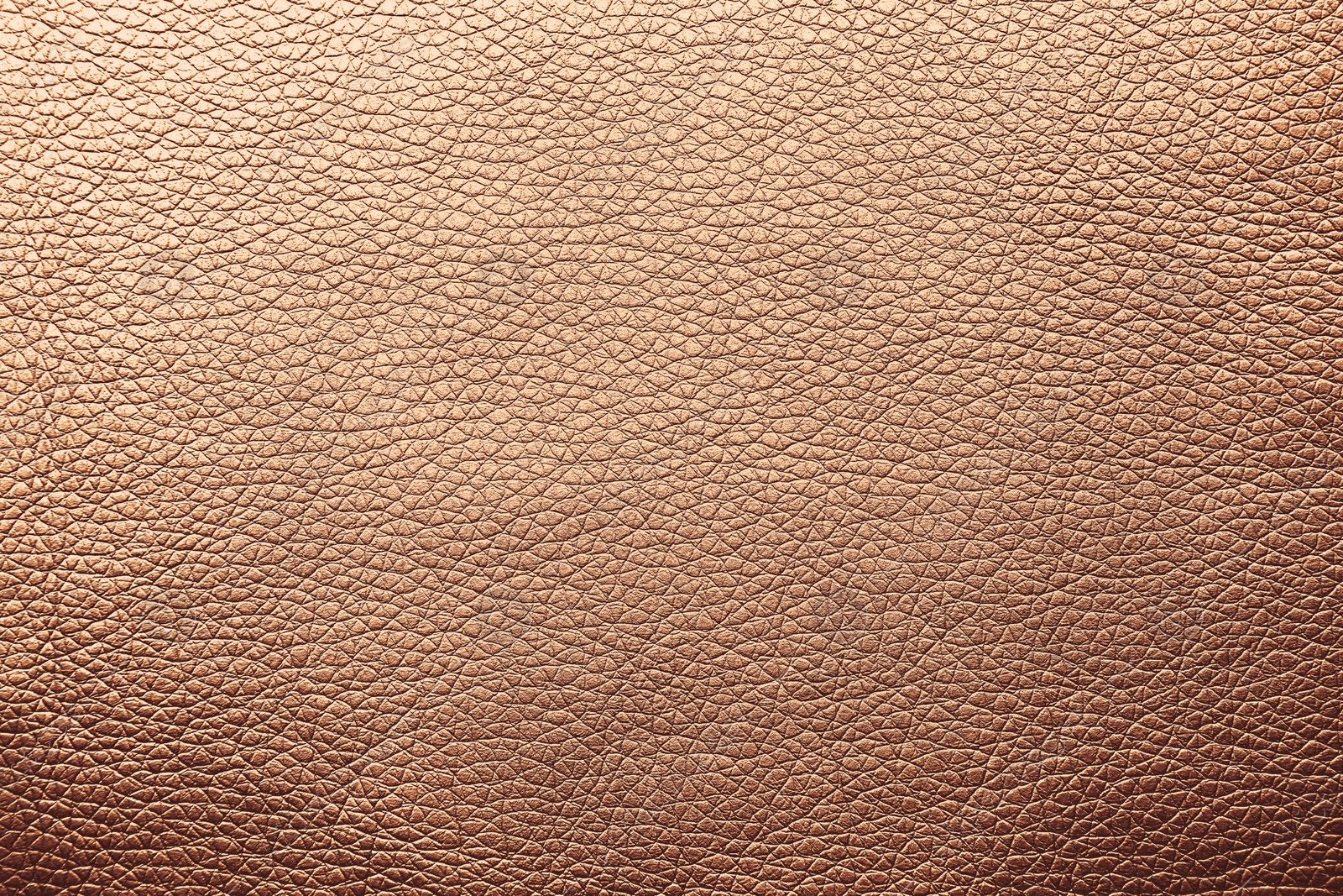 Image of Golden textured surface as background, closeup view