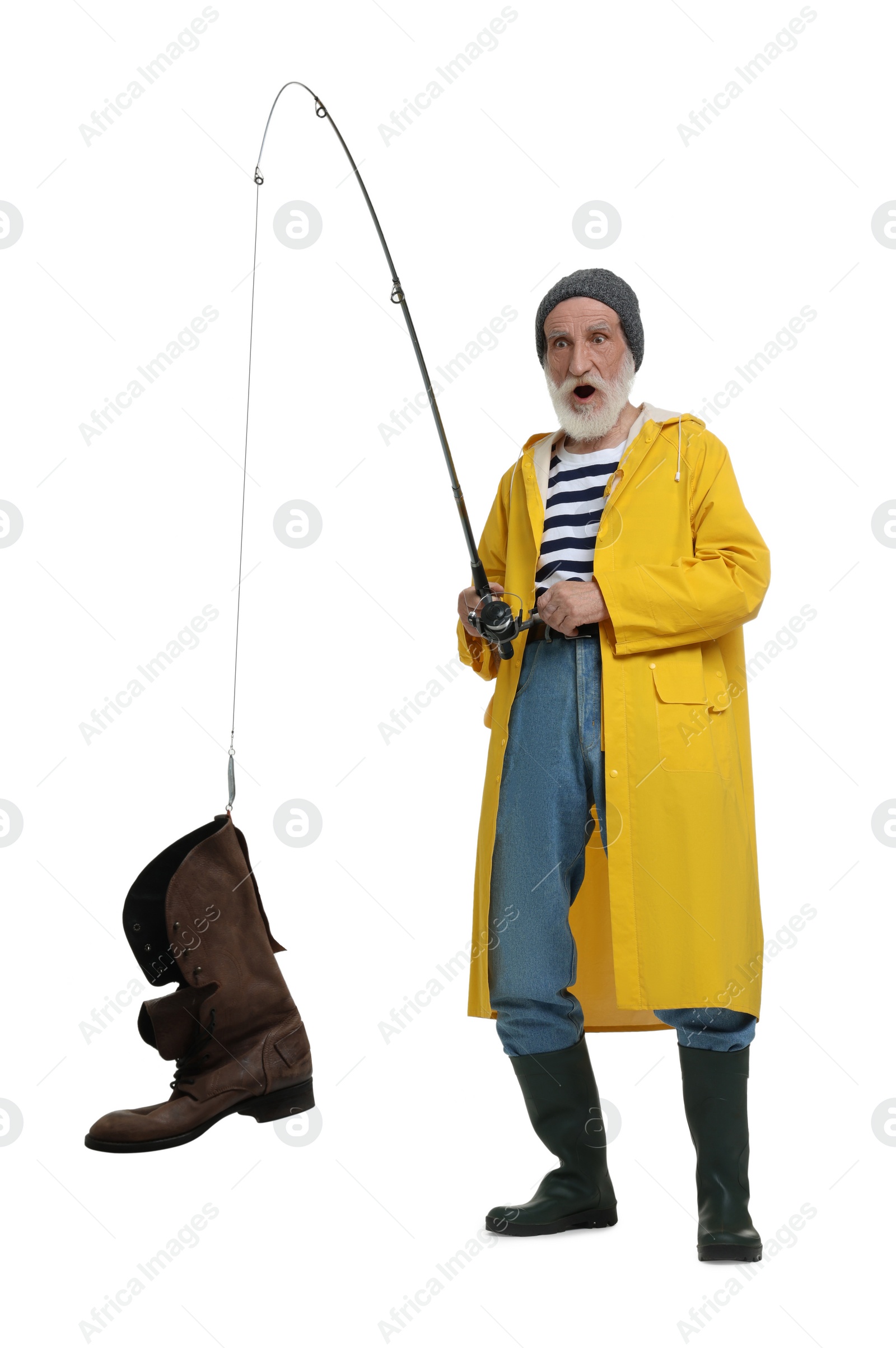 Photo of Shocked fisherman with rod and old boot isolated on white