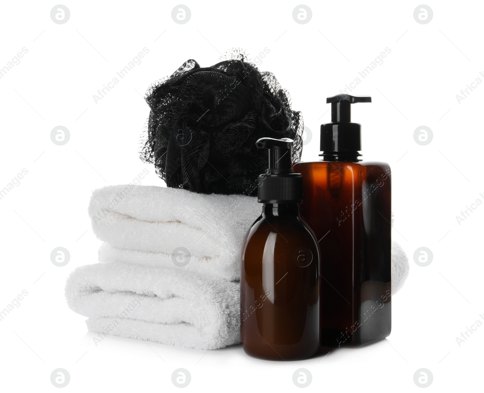 Photo of Personal hygiene products with towels and shower puff on white background