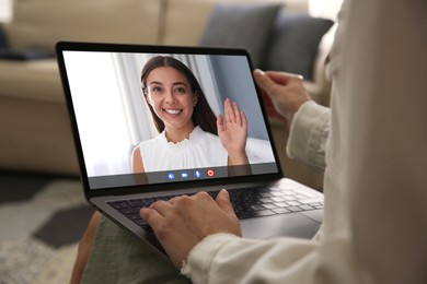 Woman using laptop for online studying, closeup. Webinar concept