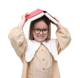 Cute little girl in glasses with open book on white background