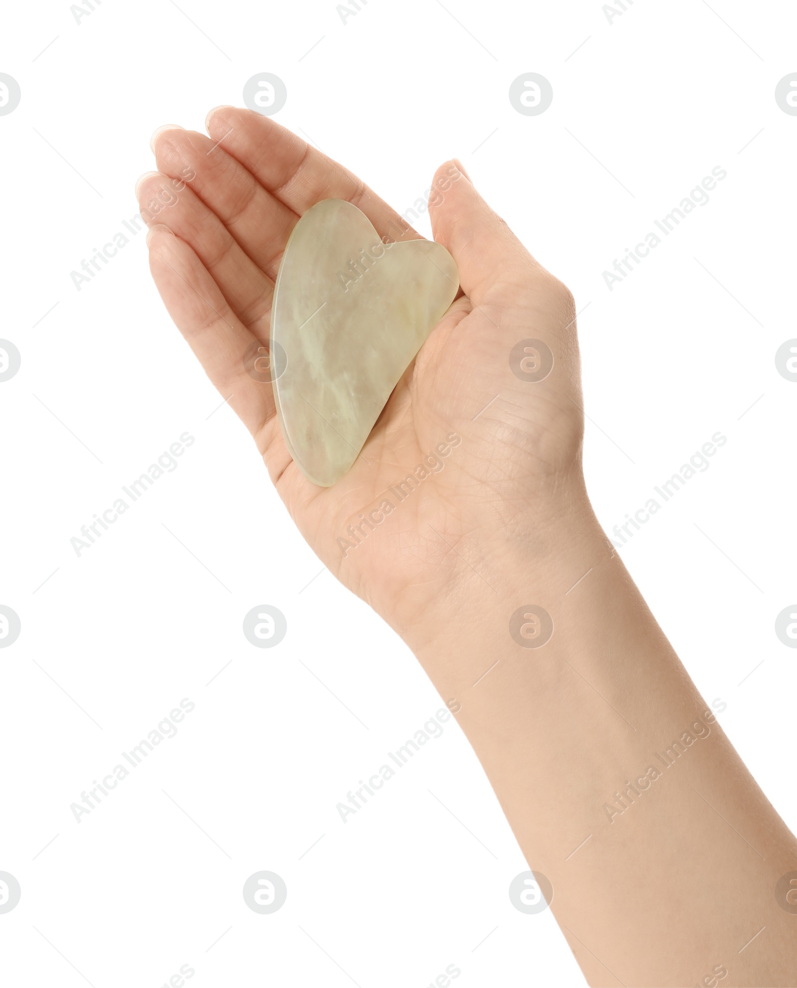 Photo of Woman with jade gua sha tool on white background, closeup