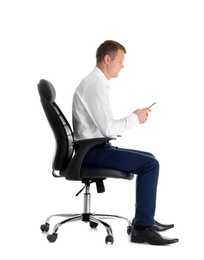 Man with mobile phone sitting in office chair on white background. Posture concept